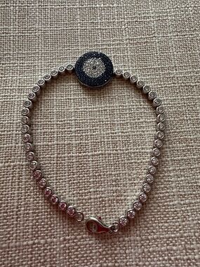 Silver Tennis Bracelet with Blue Pave Evil Eye Accent